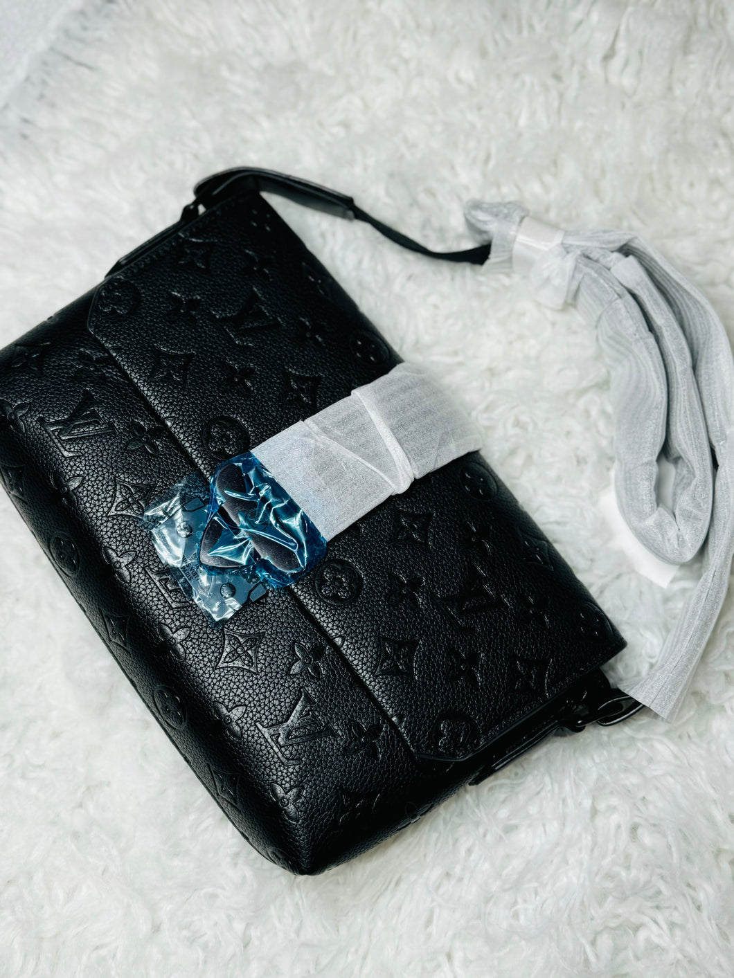 LV Deep Embossed Crossbody Bag