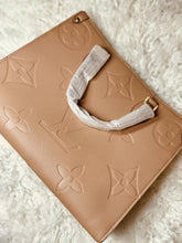 Load image into Gallery viewer, LV Embossed OTG MM Size Bag
