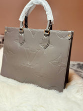 Load image into Gallery viewer, LV Embossed OTG MM Size Bag
